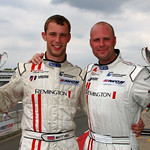 Matt (left) and Rob Bell on the podium at Silverstone following their G4 win in the British GT race on August 15th 2010